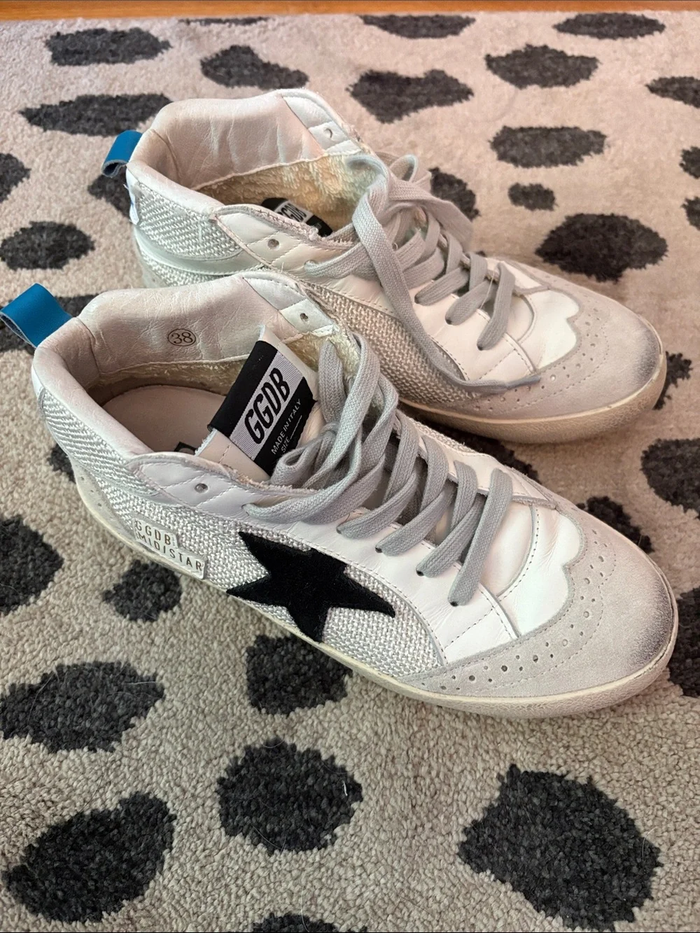 Golden Goose White High-Top Sneakers with Black Star and Blue Heel Tab